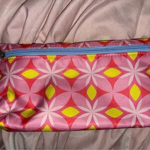 Clinique Pink Geometric Cosmetic Bag with Yellow Accents and Blue Zipper